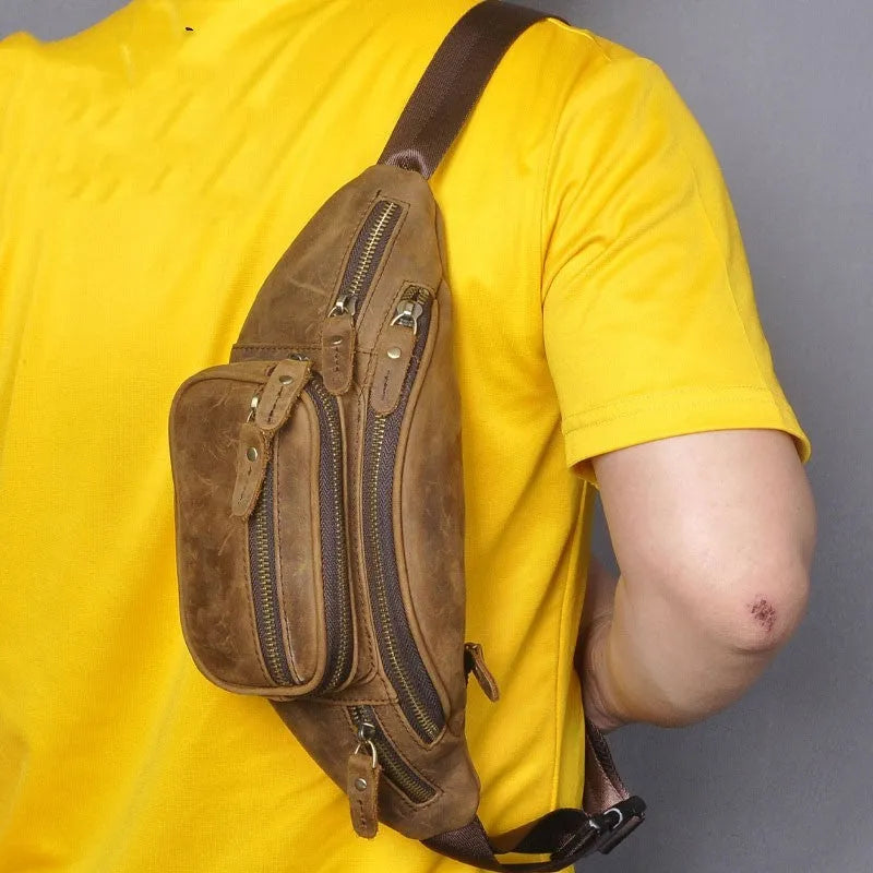 Brown retro leather messenger bag with a single shoulder strap shown open.