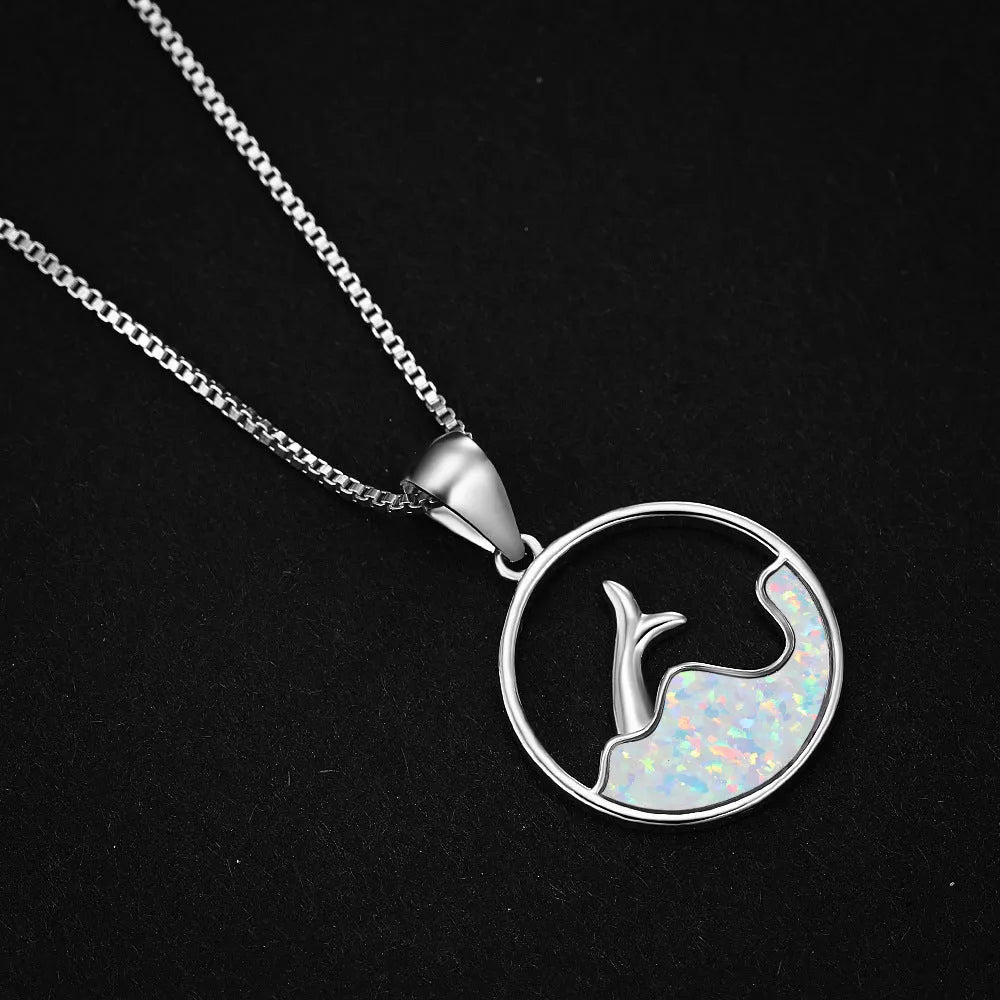 White gold electroplated copper fishtail necklace with geometric design and round opal elements