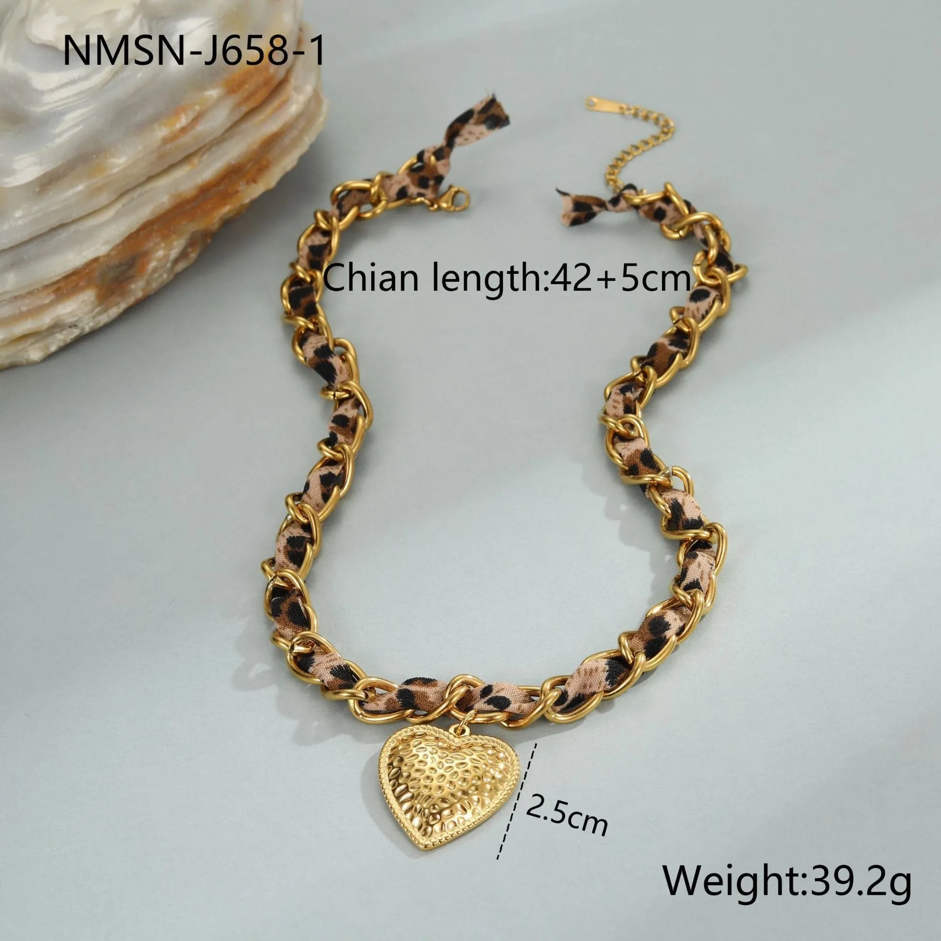 Geometric leopard love pendant on adjustable stainless steel necklace chain with gold-toned finish