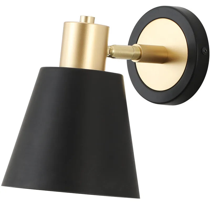 Nordic style iron wall lamp in one of four style variations for bedside or sofa lighting.