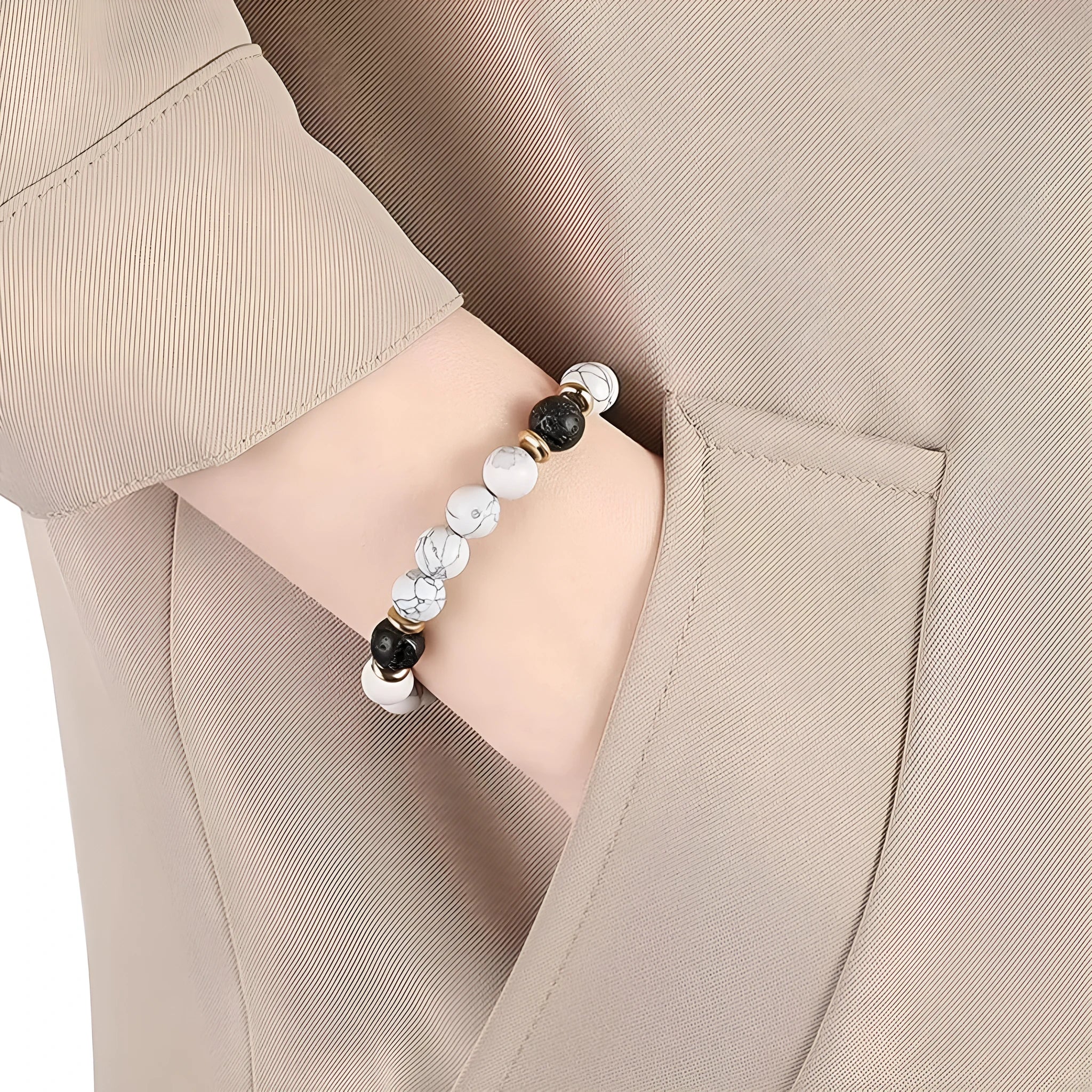 Alloy volcano white turquoise natural stone bracelet with adjustable cord on neutral background