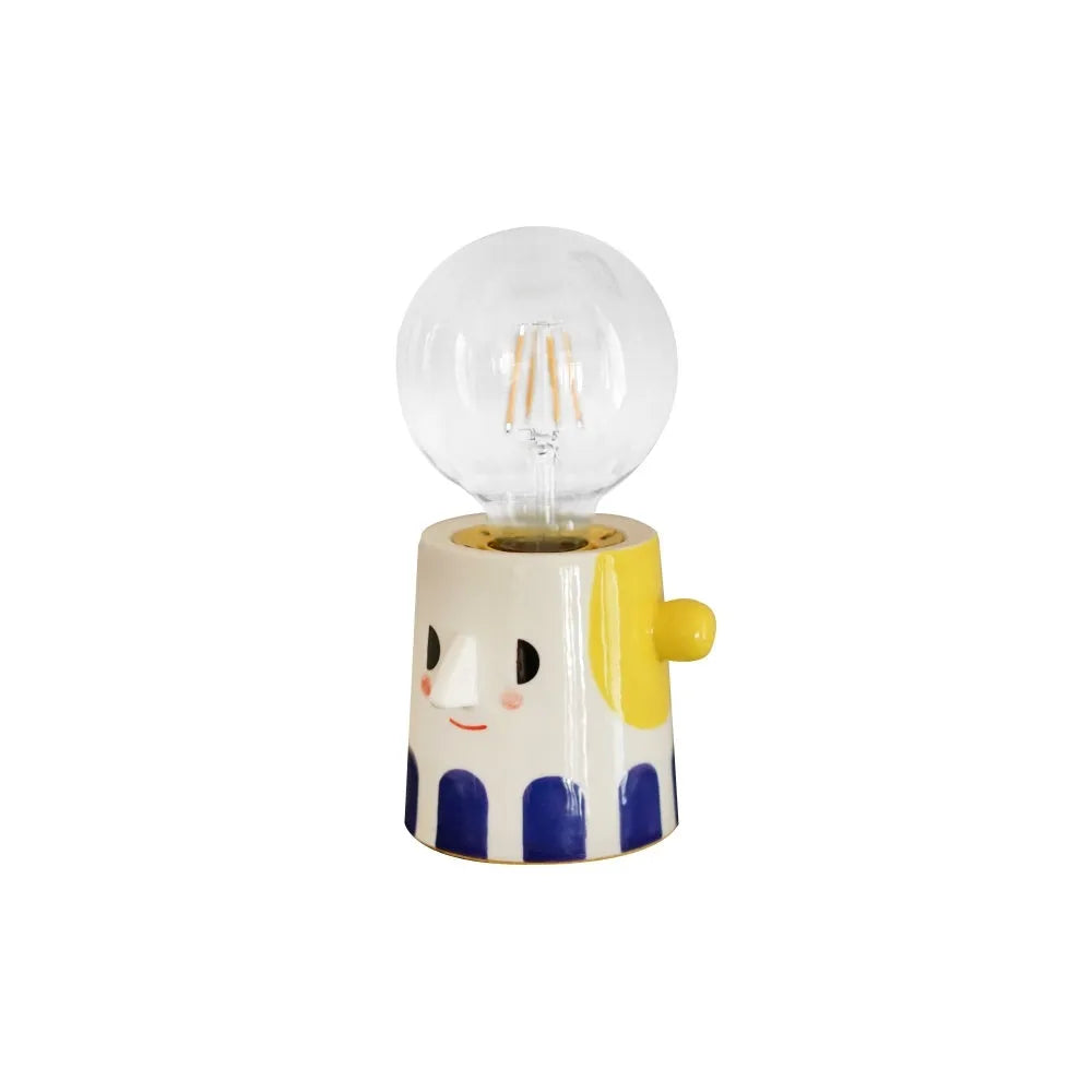 Handmade ceramic bedside lamp with ball headlight design in warm white colour