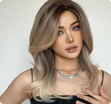 Mid-length curly full-head wig with long bangs in a white gold gradient colour