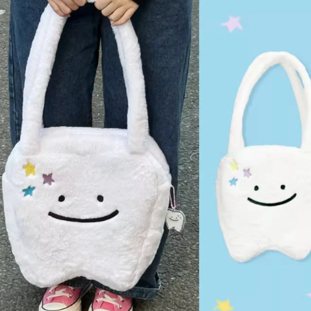 White plush shoulder tote bag with cute tooth pattern design and front zipper opening