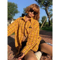 Dopamine yellow plaid shirt with loose fit cardigan style on hanger