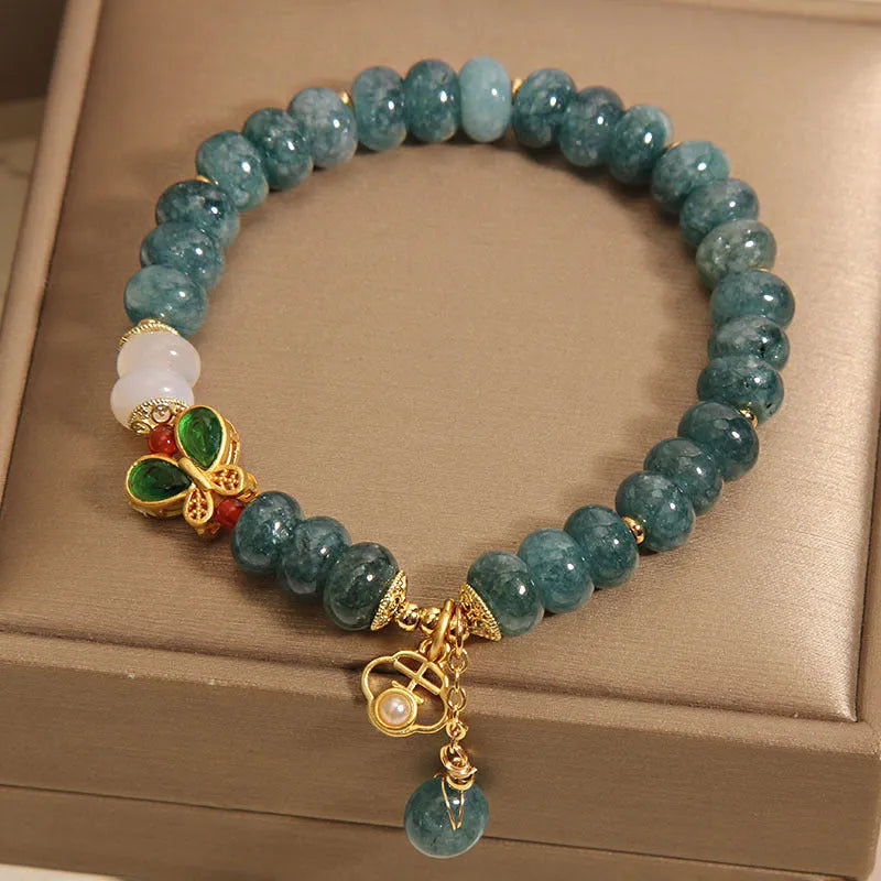 Blue water jade abacus beads crystal bracelet with white agate and butterfly motif on alloy base