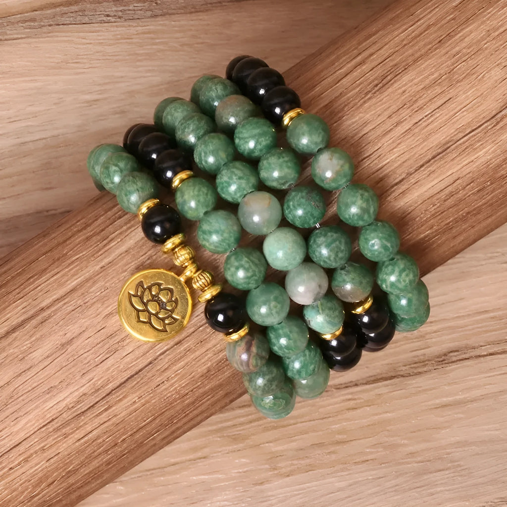 Green and black elastic beaded alloy bracelet with stretch design on wrist