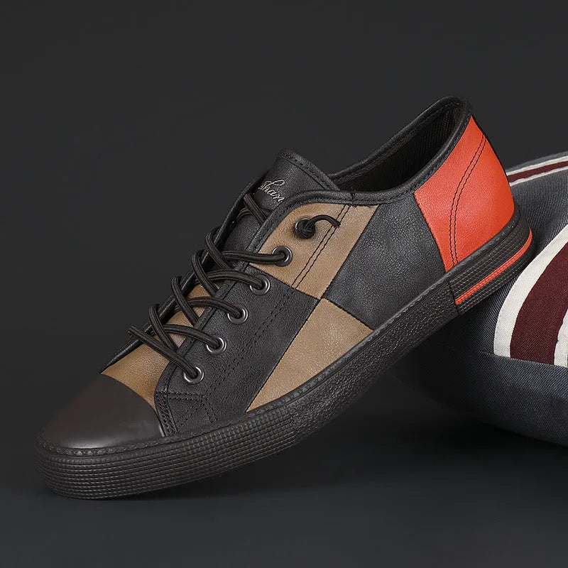 Men's black and white leather pumps with elastic band, round toe, and flat vulcanised rubber sole.
