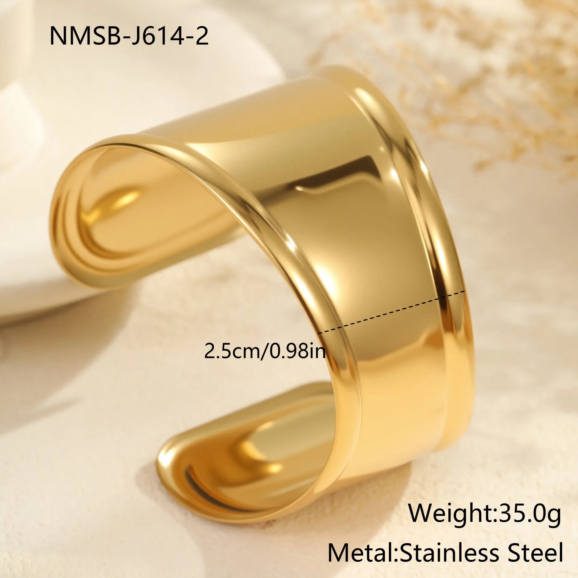 Women's geometric wave bracelet in stainless steel with gold plating and asymmetric design