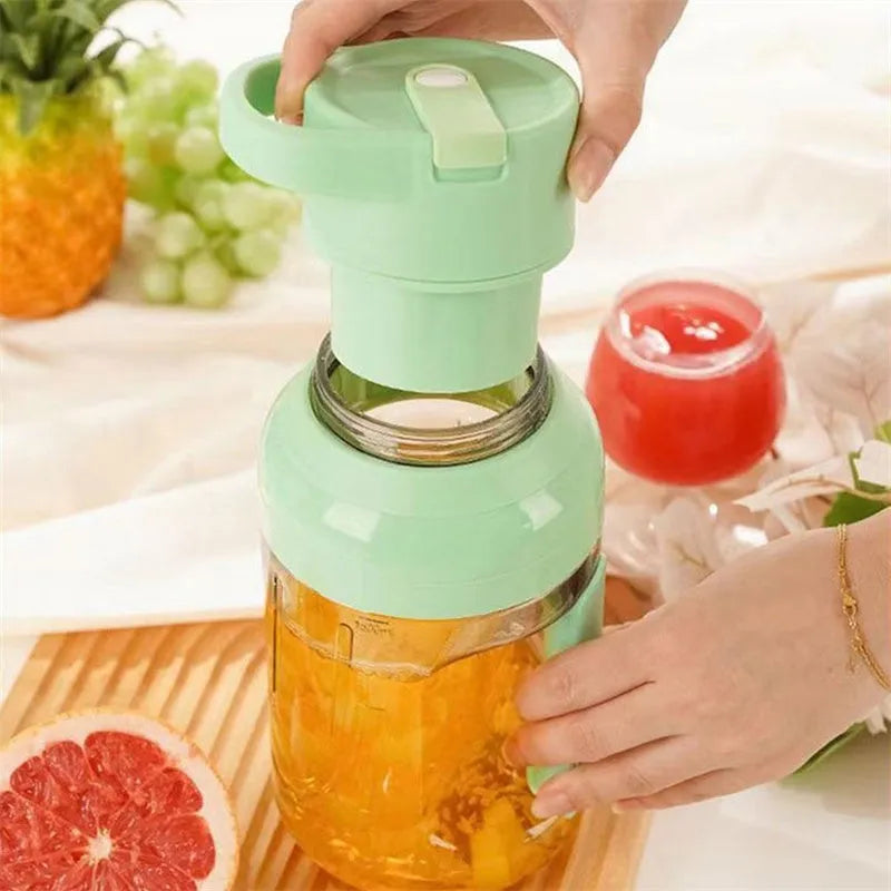 Portable electric juicer with 1500ml capacity, USB rechargeable, eight steel blades, and dual handles in pink colour
