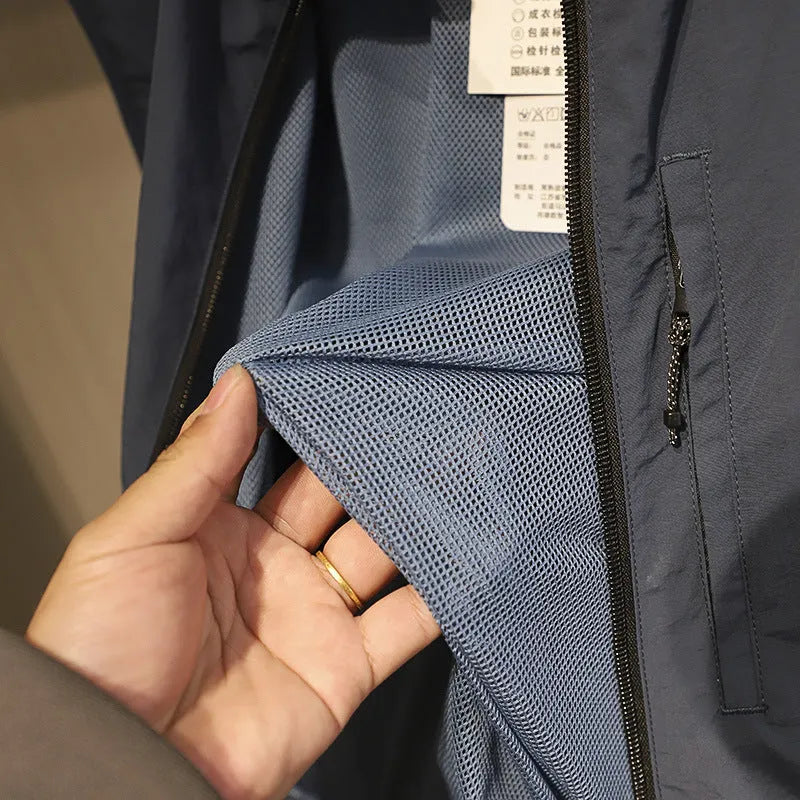 Men's solid colour nylon bandage vest with side seam pockets in straight cut design