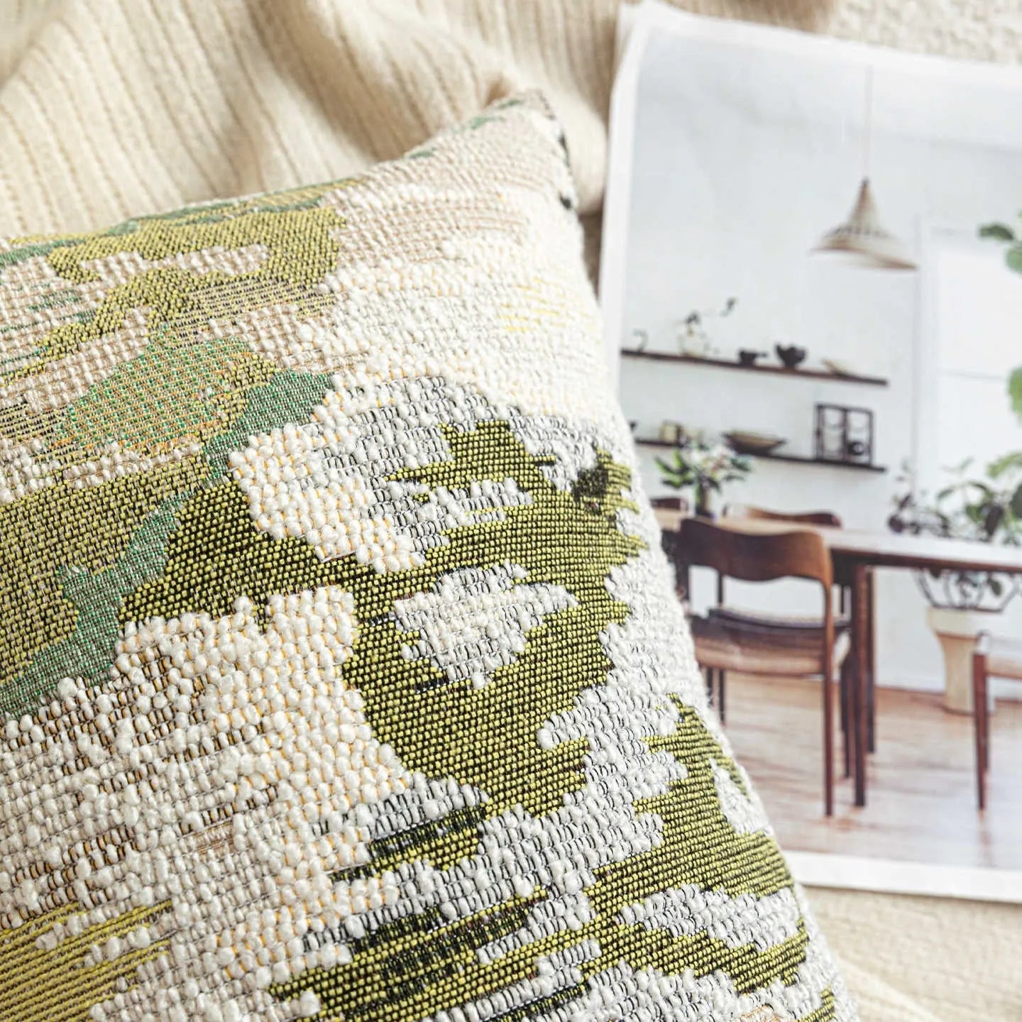 Antique green wool blended cushion with abstract spring flowers pattern, shown in square and waist pillow sizes.