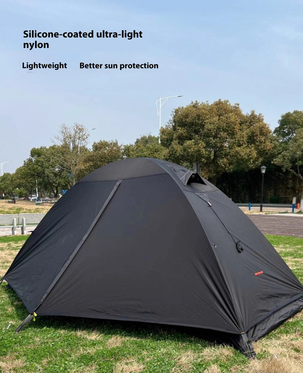 Lightweight single person camping tent with aluminium poles shown in red colour