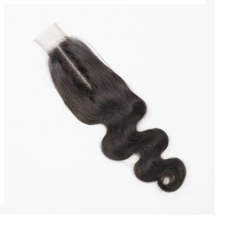 A straight, natural colour human hair wig shown on a model, demonstrating the sleek exotic style.