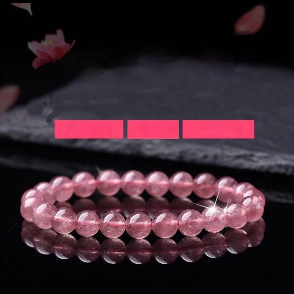 Women's strawberry quartz crystal bracelet with polished beads in three size options