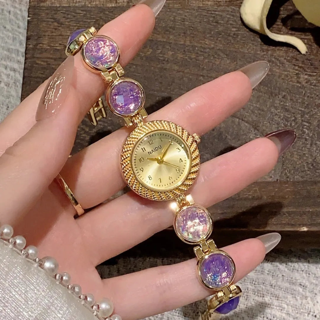 Women's quartz watch with 25mm round dial in zinc alloy case, showing spiral crown and choice of six colours.