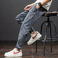 Men's loose fit cargo jeans in blue with straight leg cut and micro elasticity fabric