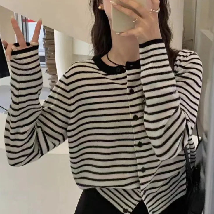Dark grey and white striped women's cardigan with long sleeves and a short 40cm length.