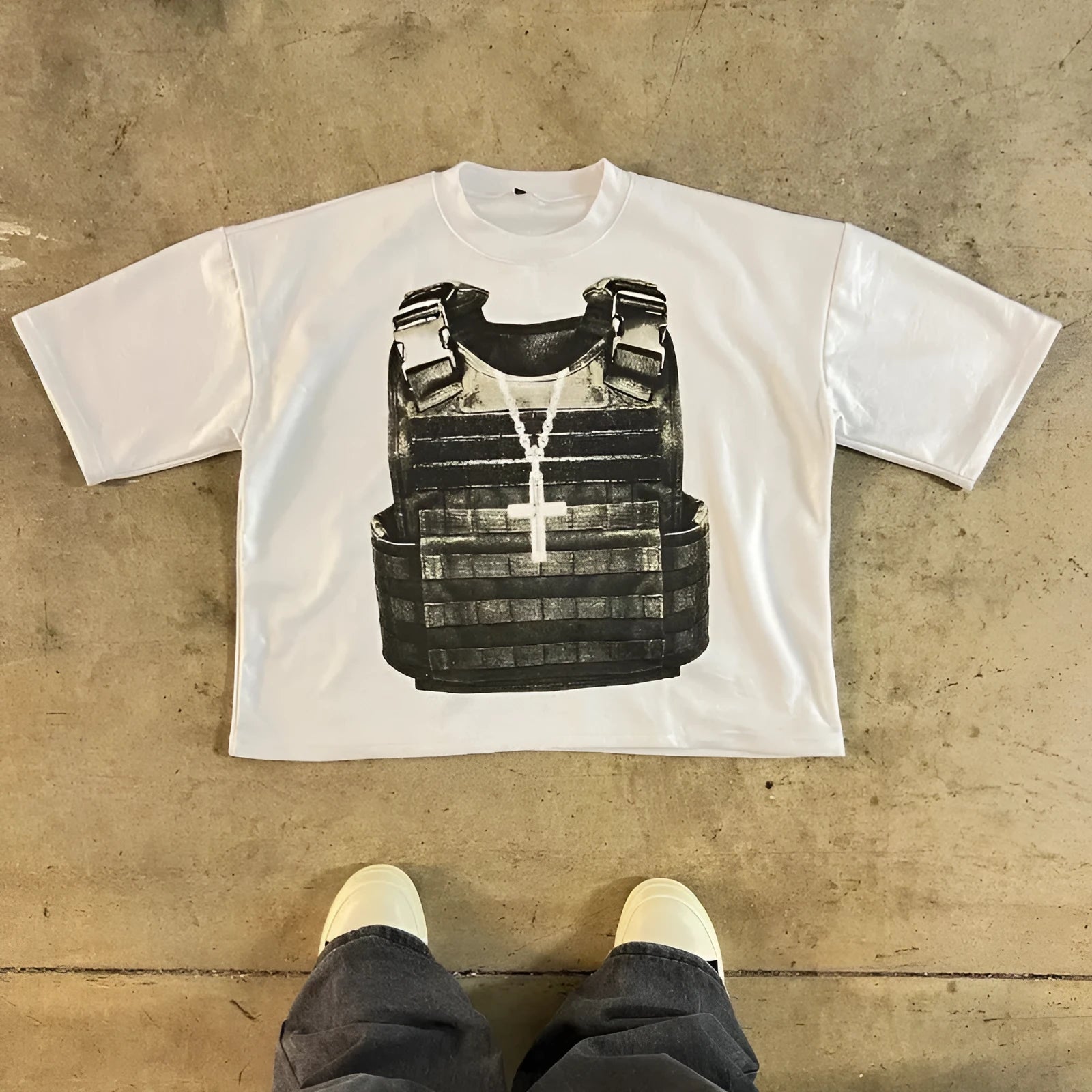Printed retro style cotton short sleeve t-shirt with drop-shoulder sleeves on a solid background.