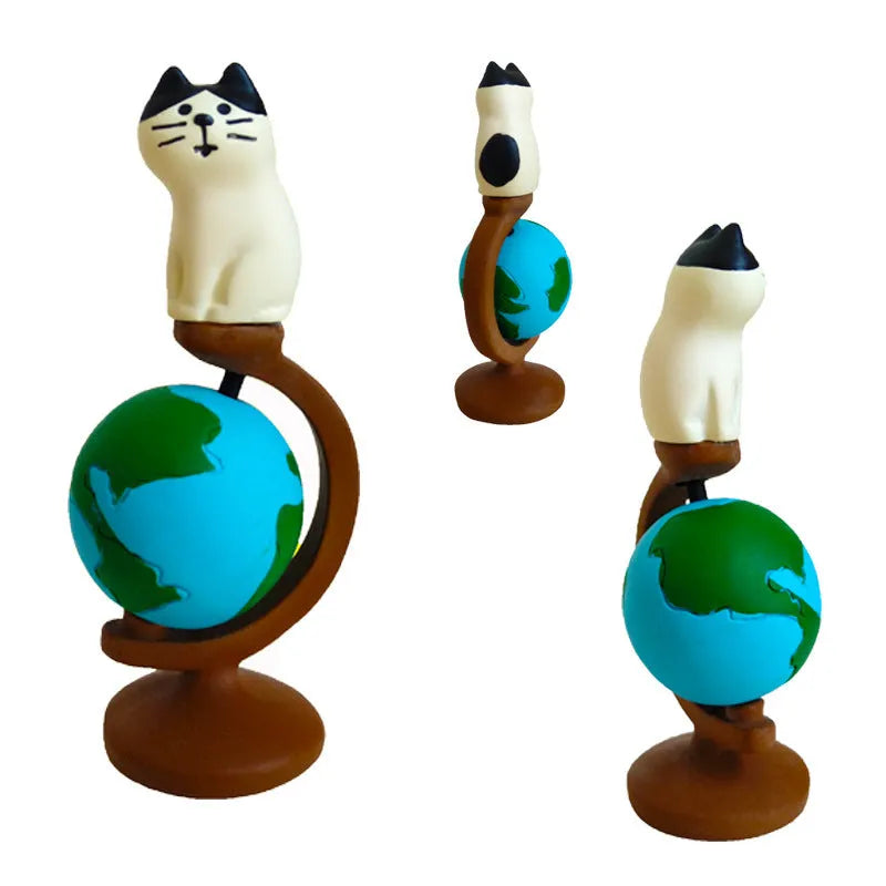 Resin cat figurine dressed as Statue of Liberty with torch, travel theme, carp cat or earth instrument cat styles