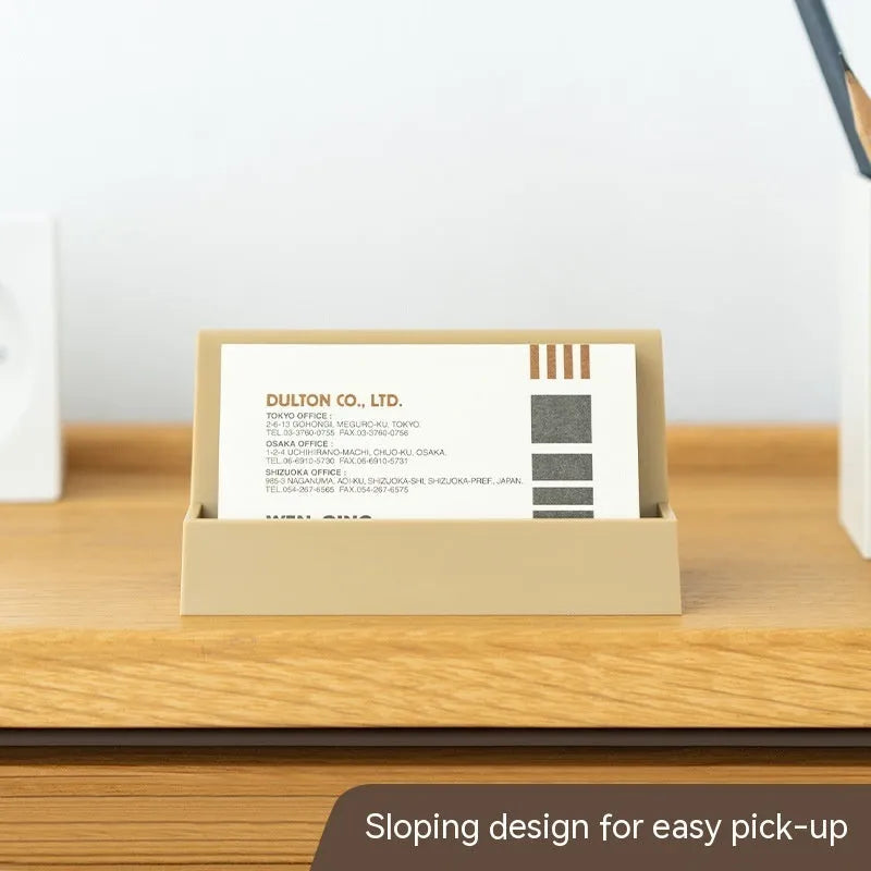 Creative business card storage display stand in geometric PS material, holds 20 cards, available in six colours