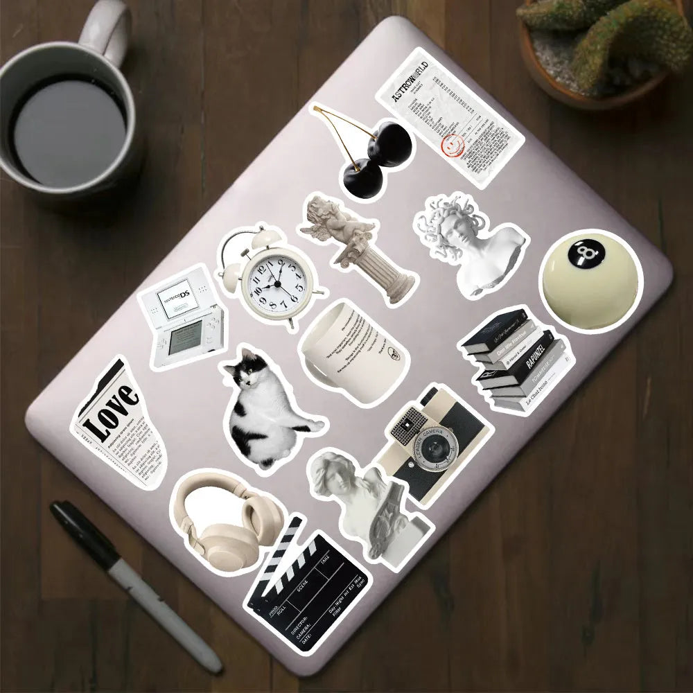 A pack of 61 black and white simple design waterproof PVC stickers for laptops and personal items.