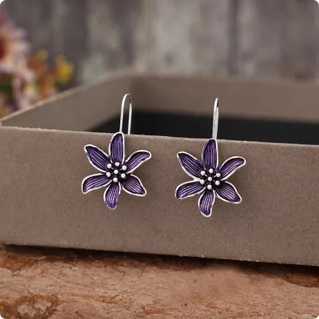 Purple flower-shaped alloy earrings with electroplated finish measuring 3cm in length