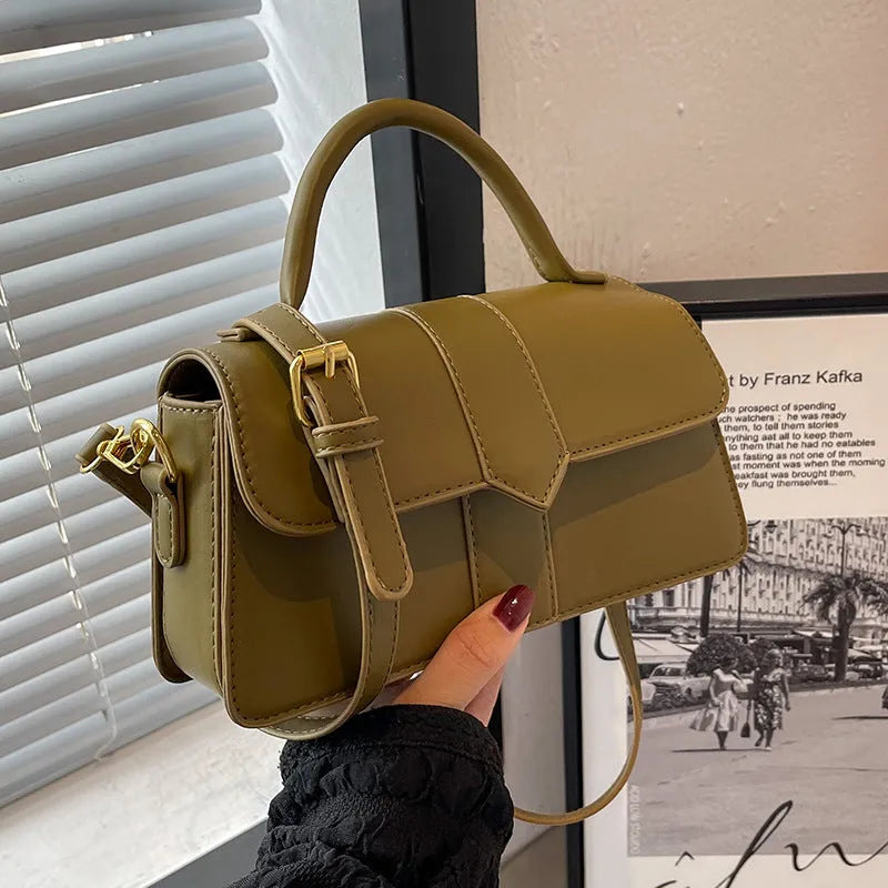 Women's beige PU messenger bag showing internal file organisation and sandwich pocket exterior