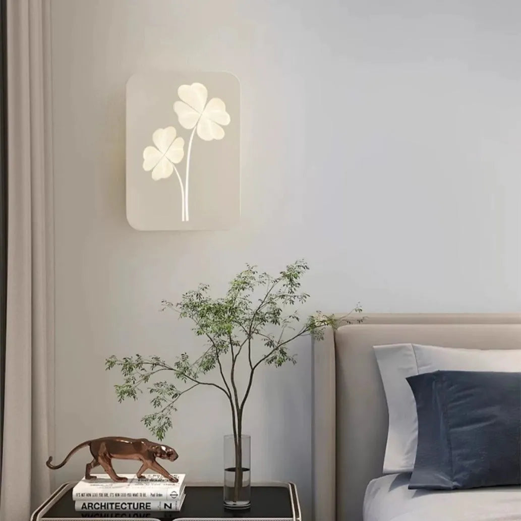 Modern wall lamp with decorative acrylic shade showing love heart design in pink colour option