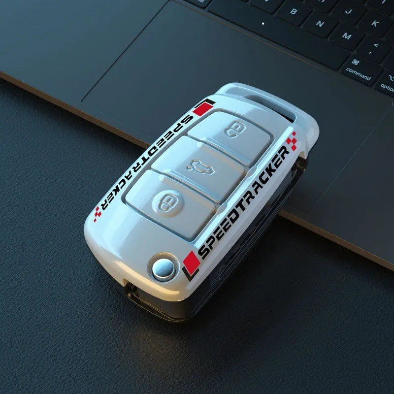 Carbon fibre style car key cover with mirror finish in carbon and white colour options