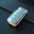 Carbon fibre style car key cover with mirror finish in carbon and white colour options
