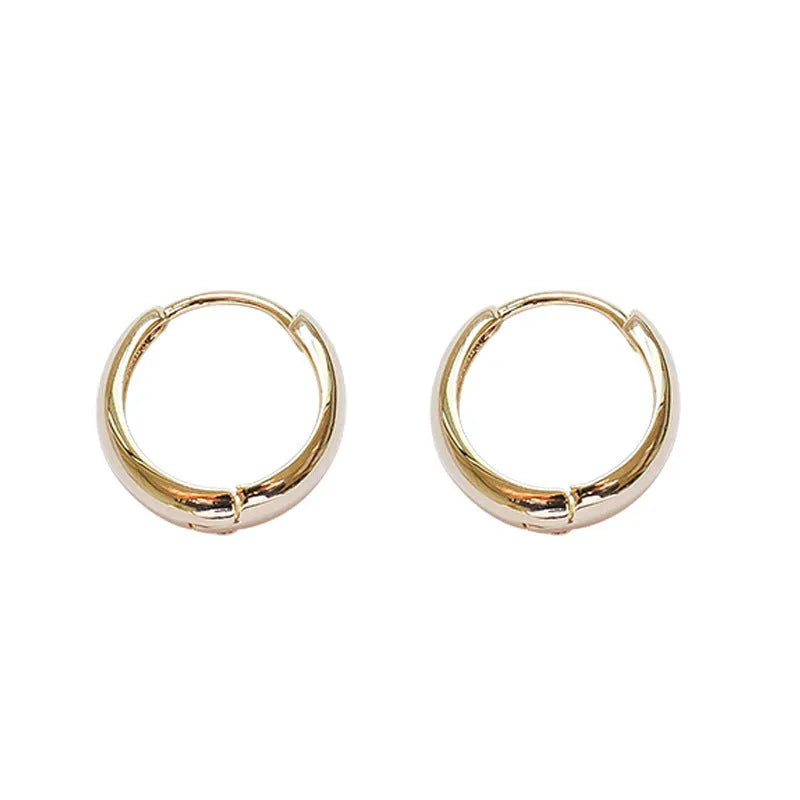 Women's retro minimalist geometric water drop earrings in gold and silver tone, shown in small, medium, and large sizes.