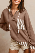 Straw yellow waffle texture hoodie with striped patchwork panels and button neck closure