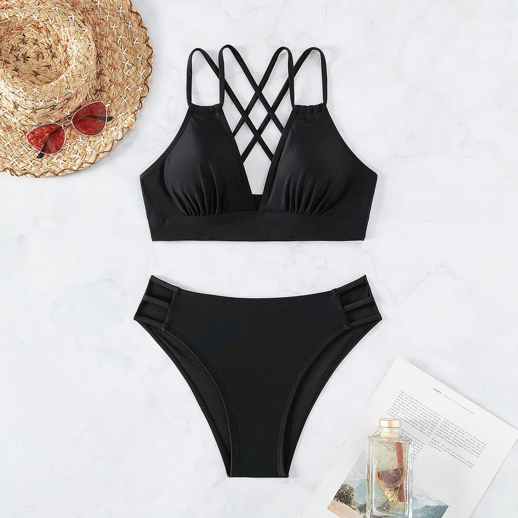 Women's halterneck bikini swimsuit with V-neck design and split shorts in nylon fabric