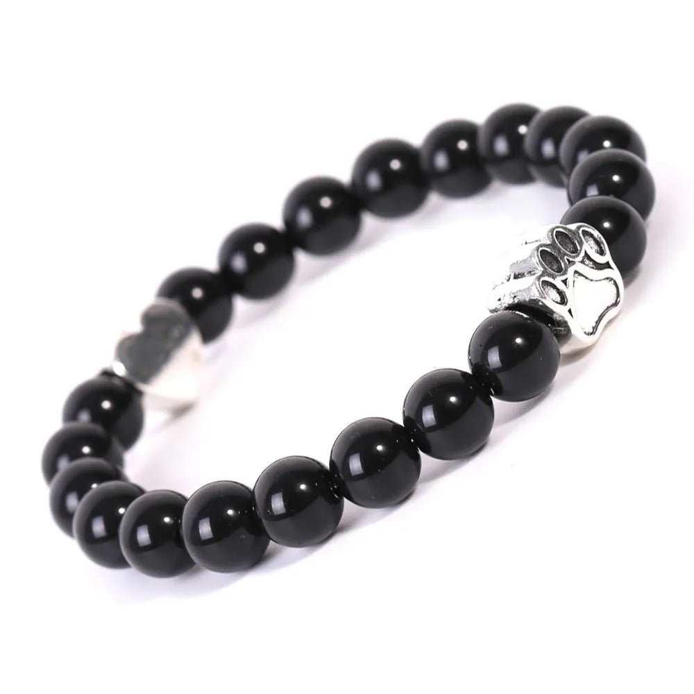 Indian agate stone bracelet with dog's paw and love heart geometric designs on wrist