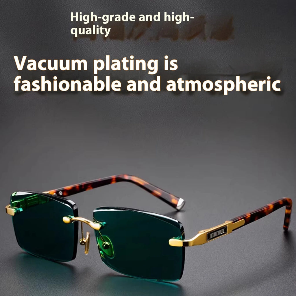 A pair of frameless rectangular sunglasses with dark green crystal lenses, a case, and a lens cloth.