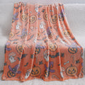 Colourful cartoon-patterned flannel blanket for children, shown in two different sizes.