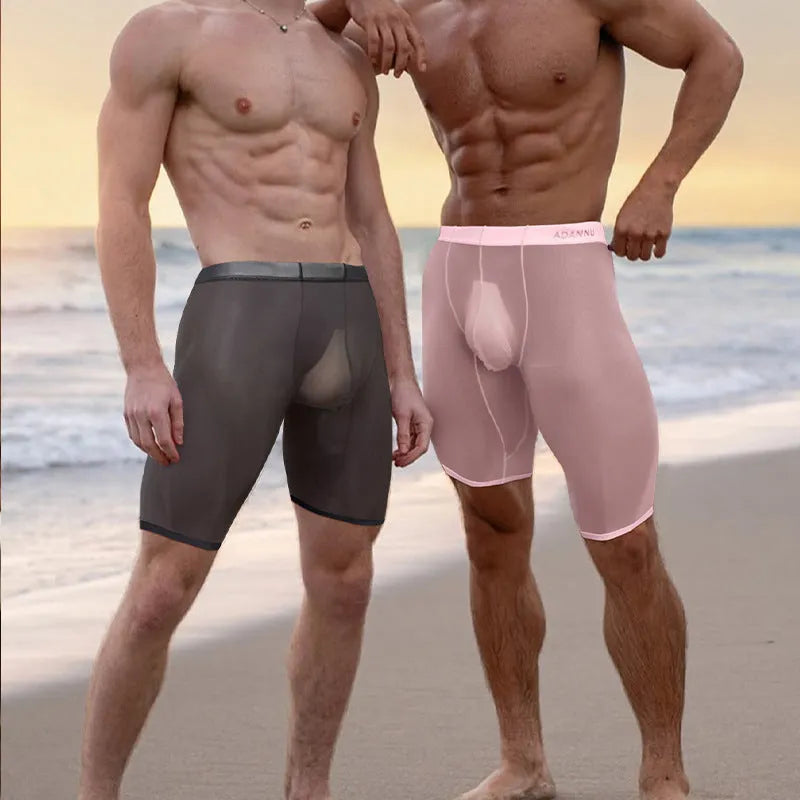 Men's black mesh nylon shorts with seamless knit construction for home lounging.