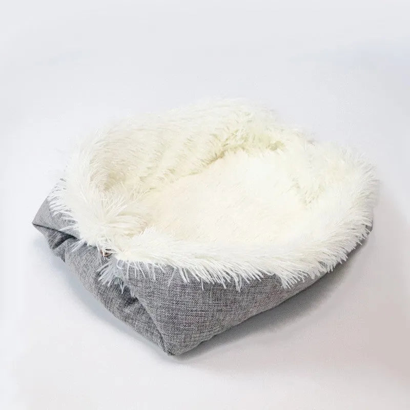 Gray self-heating pet blanket nest with long plush fur and non-slip black bottom, 61x51 cm
