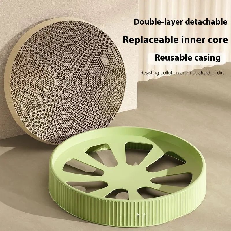 Round green and white cat scratching board nest measuring 55cm with corrugated paper surface.