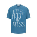 Men's blue cotton blend t-shirt with printed letter design showing loose fit and round neck