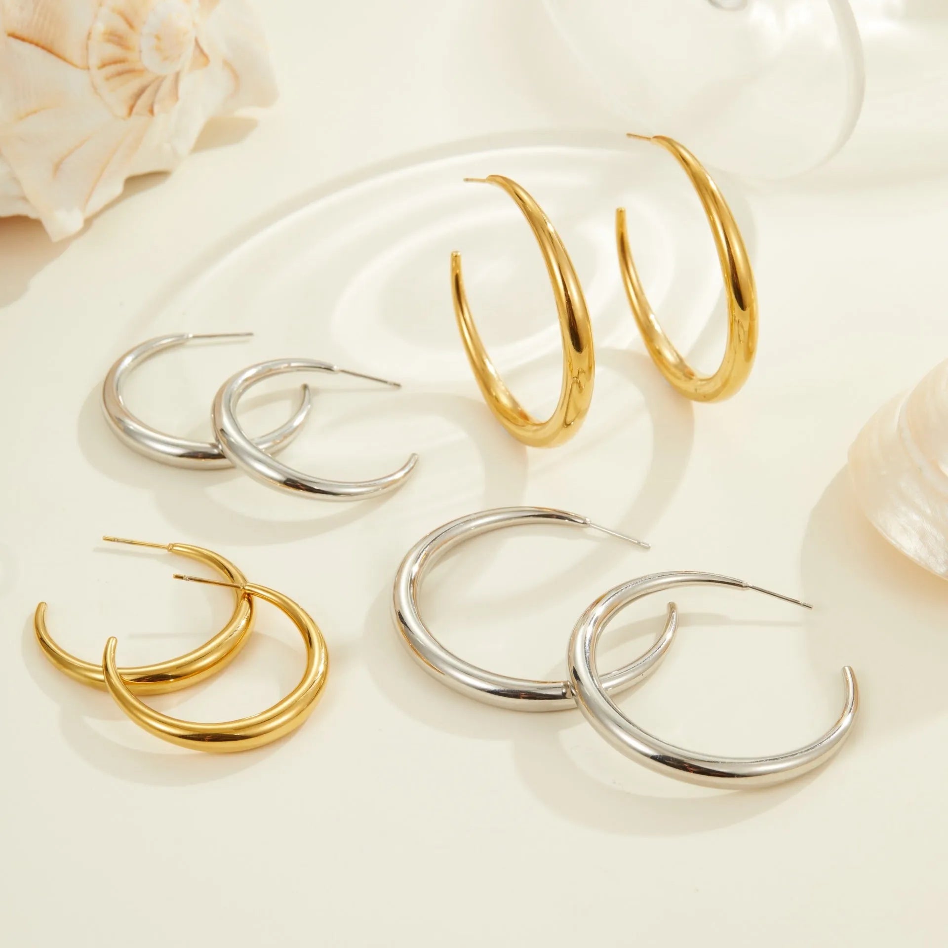 Geometric hoop earrings for women in stainless steel with gold or steel finish options