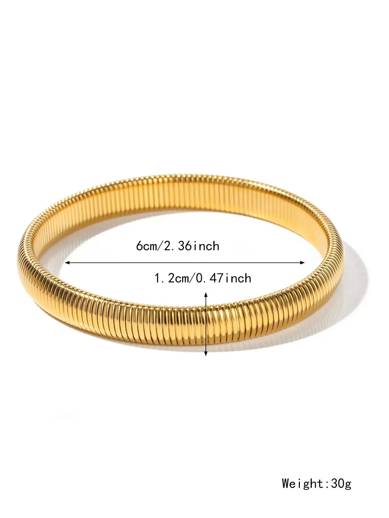 Gold titanium steel women's bracelet with elastic band and exaggerated vertical stripe ring pattern.