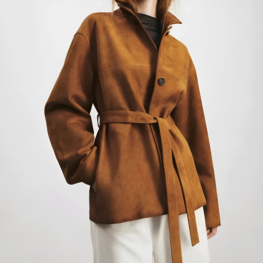 Yellow brown retro cashmere coat with Peter Pan collar, belt, and leather stitching detail.