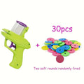 Interactive cat toy launcher with foam discs in green and purple colour options for battery-free feline play