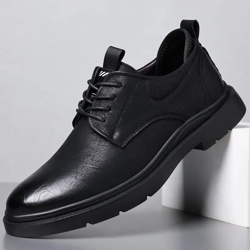 Men's leather shoes in black or brown with sewing line detailing on cowhide upper and rubber sole