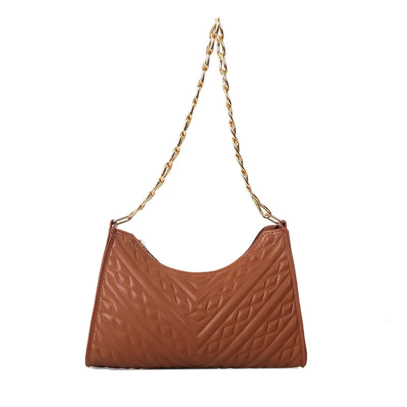Black pleated chain baguette shoulder bag with adjustable strap and soft handle on white background