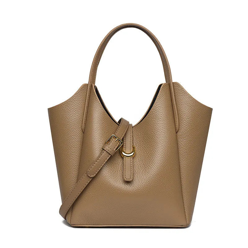Genuine leather women's bucket handbag in European American retro style with hand holding design