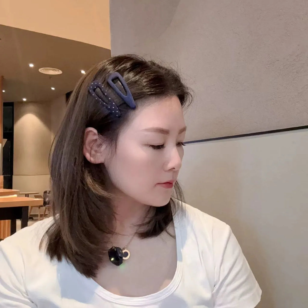 Retro dot side barrettes for women in triangle and water drop styles with dark denim and polka dot motifs.