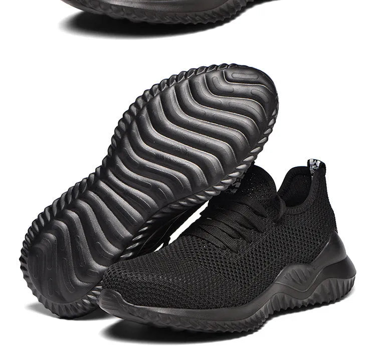 Safety work shoes with steel toe caps in black, grey, and dark green colours for industrial and outdoor use